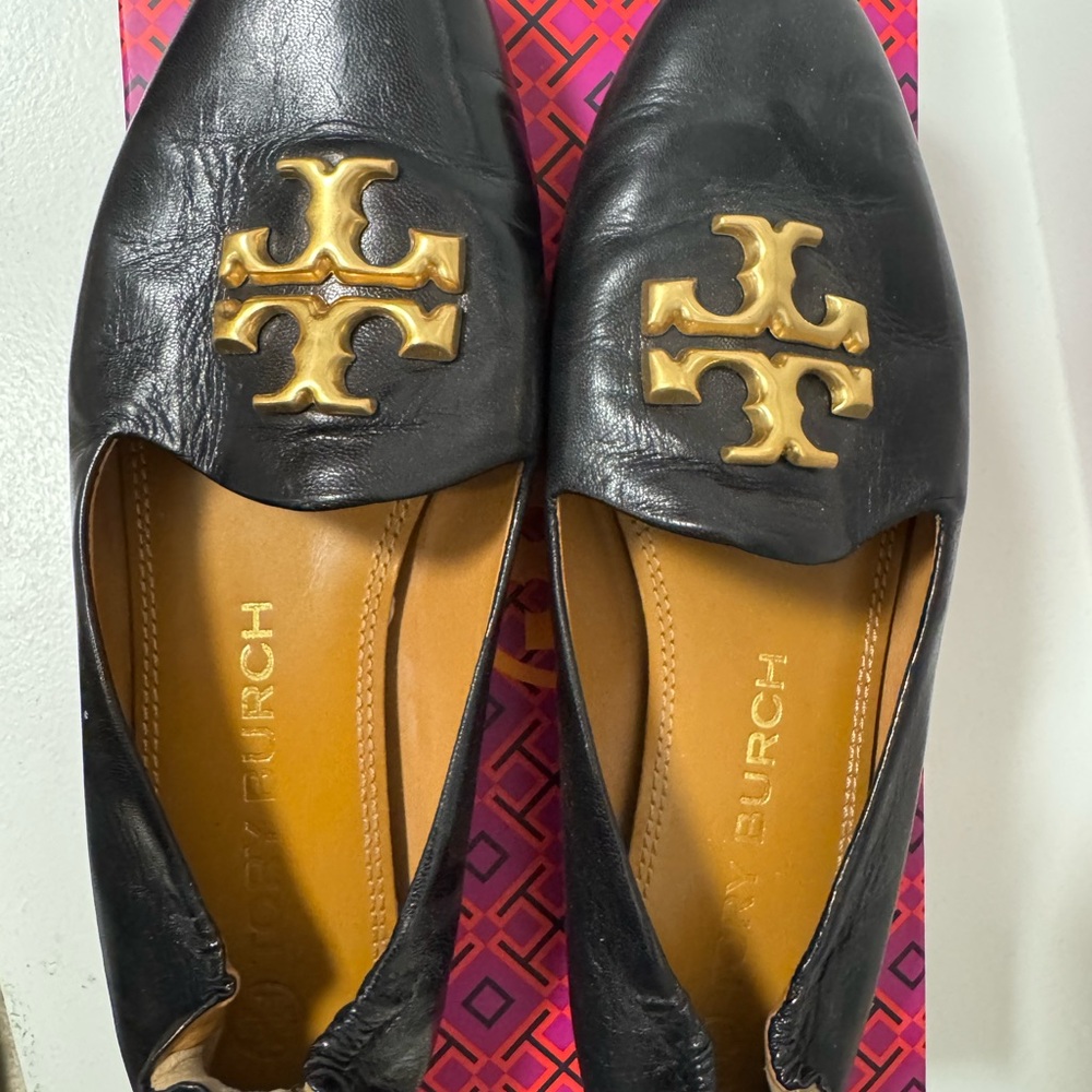 Tory Burch Black and Gold Flats with Iconic Logo